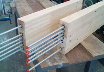 High tensile steel allthreaded bars bonded into Timber Resin Splice beam end repair units.